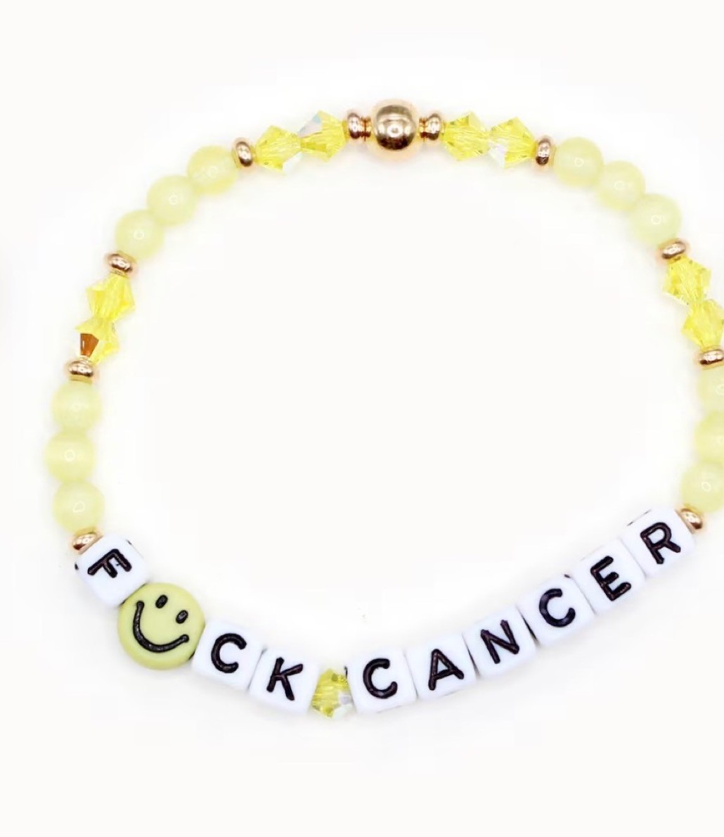 Drew's beaded Fuck Cancer bracelet