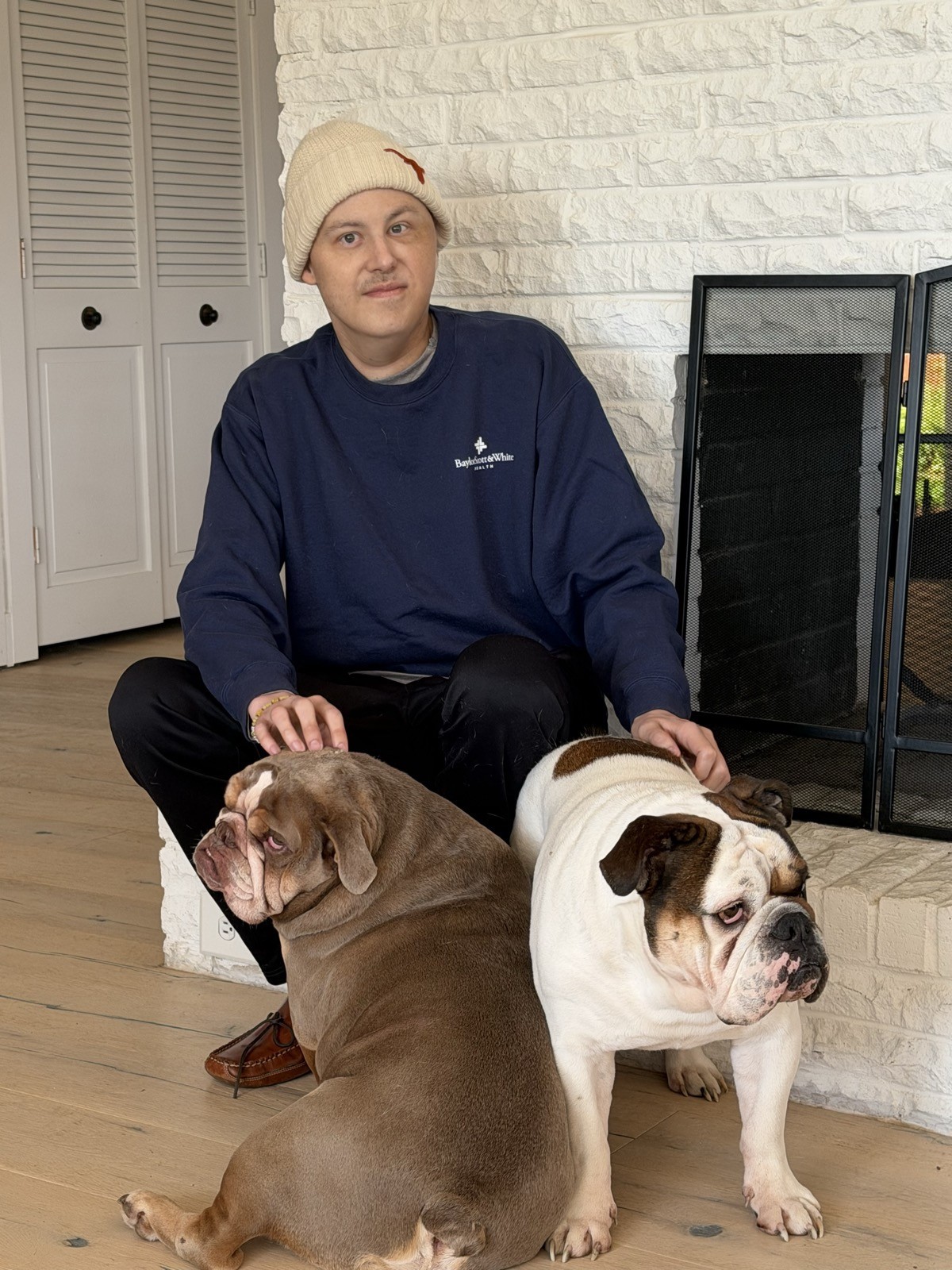 Drew at home with his dogs